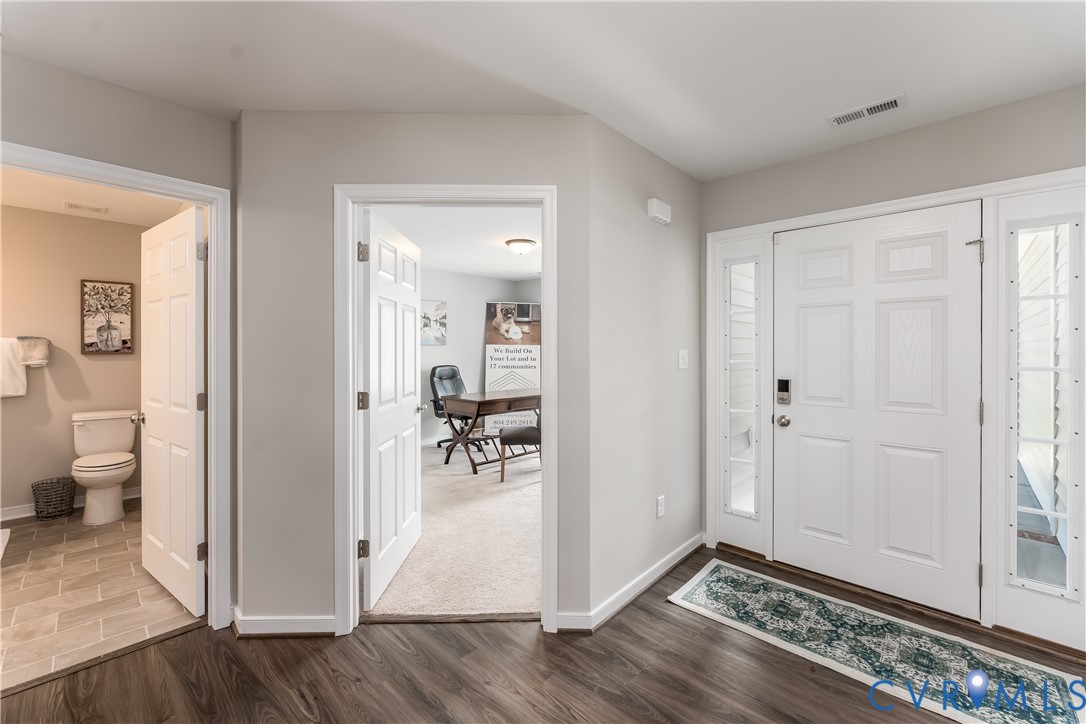 140 Wendenburg Court, Unit F6 Aylett, VA 23009 - Photo 5 of 33 Entrance foyer featuring dark wood-type flooring a