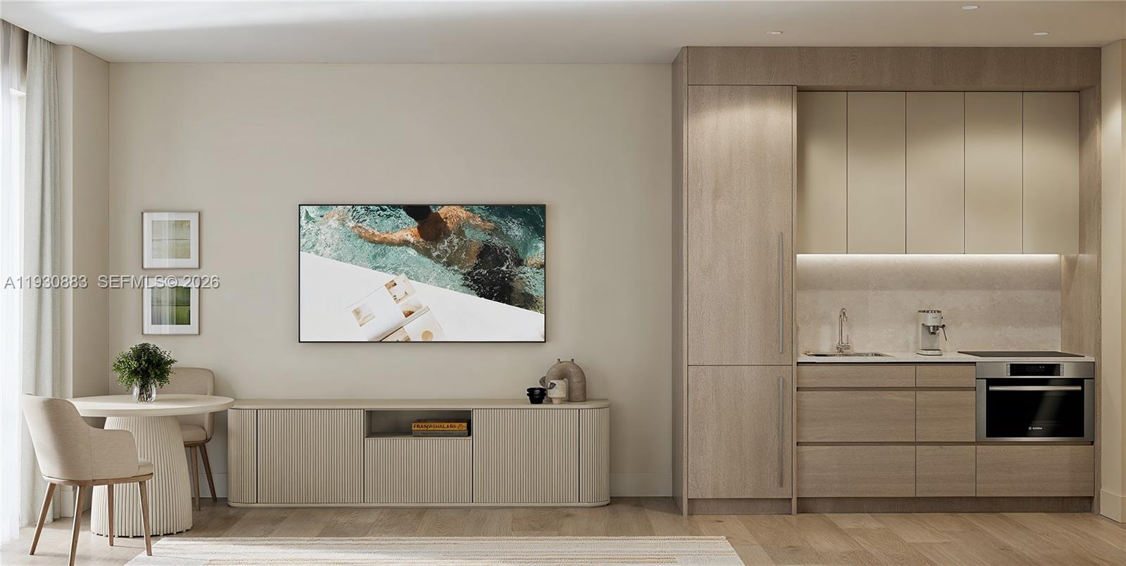 1741 Southwest 2nd Avenue, Unit 427 Miami, FL 33129 - Photo 3 of 20 a view of a kitchen with a sink and a stove top oven