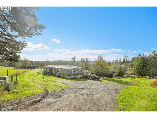 a view of a lake with houses in the background