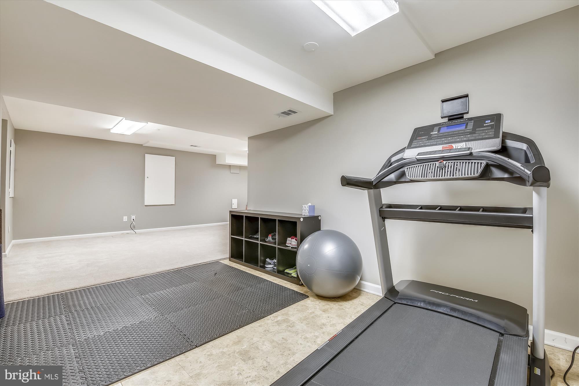 1588 Kimblewick Road Potomac, MD 20854 - Photo 15 of 36 Lower Level Exercise Space