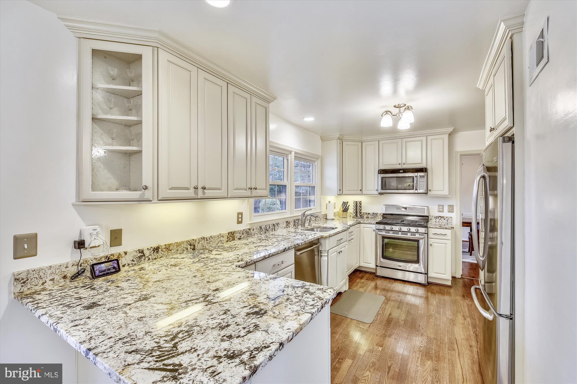 1588 Kimblewick Road Potomac, MD 20854 - Photo 6 of 36 Kitchen with granite and stainless