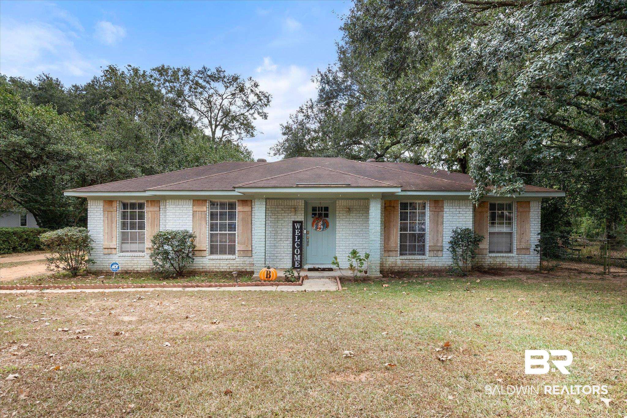 9987 Downing Street Semmes, AL 36575 - Photo 1 of 20 Ranch-style house with a front lawn