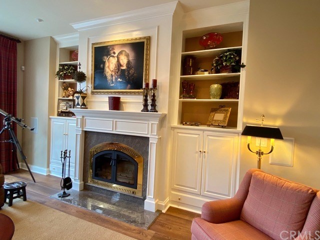 1010 Black Oaks Drive Lake Arrowhead, CA 92352 - Photo 23 of 52 a living room with furniture and a fireplace