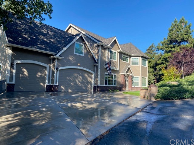 1010 Black Oaks Drive Lake Arrowhead, CA 92352 - Photo 3 of 52 a view of a house with a yard