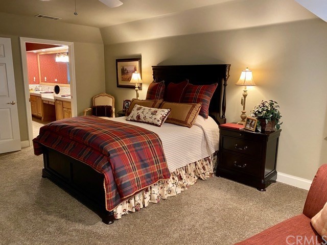 1010 Black Oaks Drive Lake Arrowhead, CA 92352 - Photo 31 of 52 a bedroom with a bed and a lamp