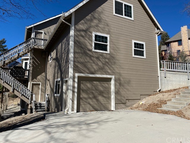 1010 Black Oaks Drive Lake Arrowhead, CA 92352 - Photo 45 of 52 a view of a house with a street