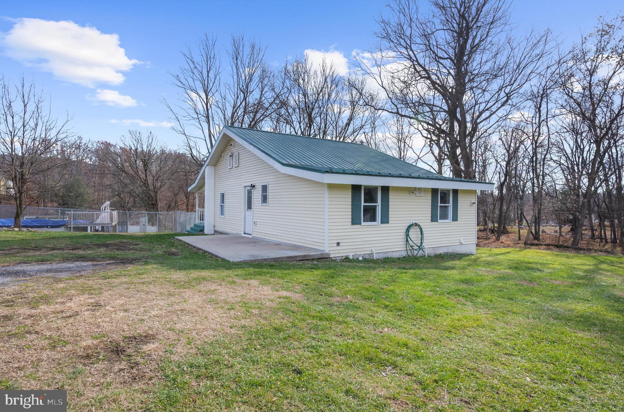2219 Back Road Sharpsburg, MD 21782 - Photo 26 of 31 a view of a yard with a house and a tree