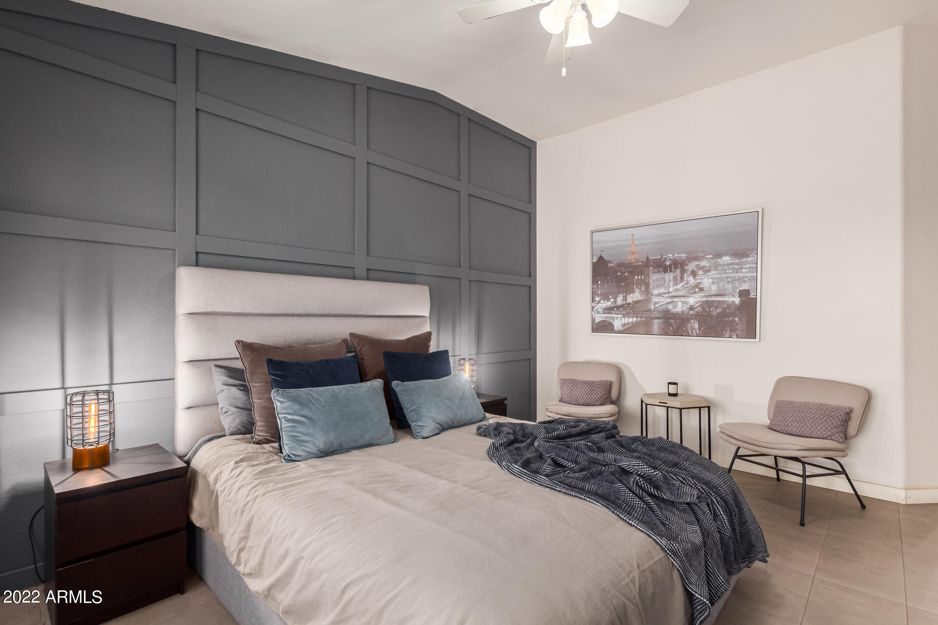 5515 South 15th Way Phoenix, AZ 85040 - Photo 18 of 28 a bedroom with a bed and a chandelier