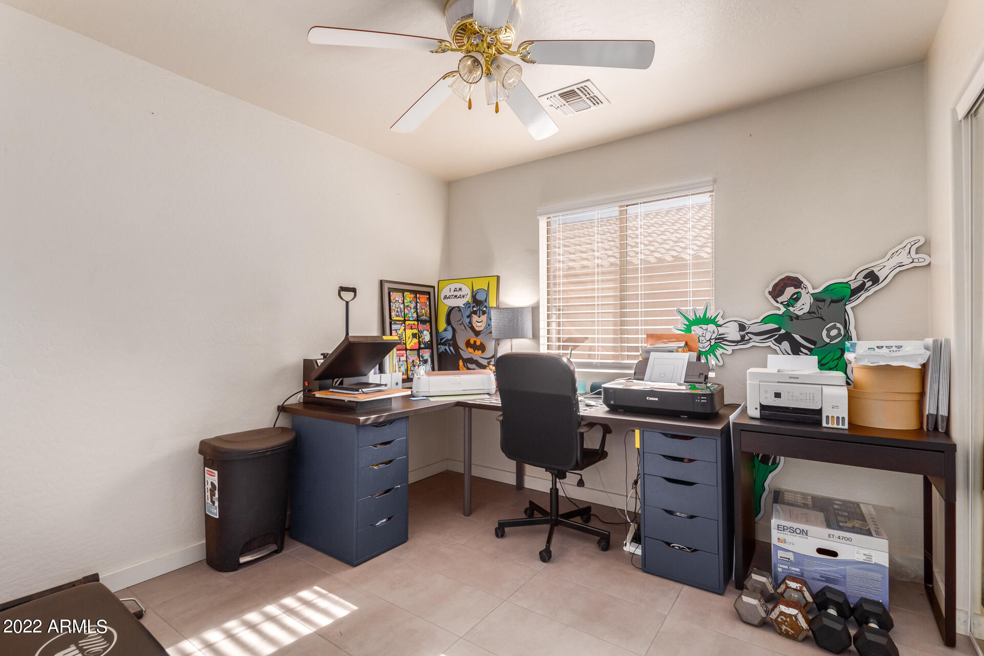 5515 South 15th Way Phoenix, AZ 85040 - Photo 23 of 28 a view of a workspace with furniture and a window
