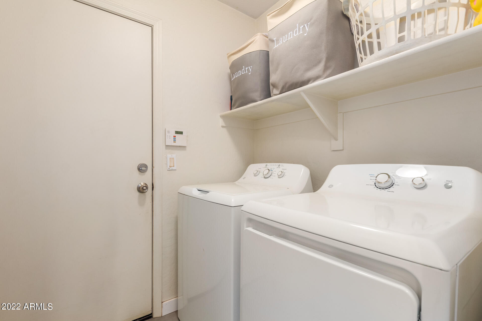 5515 South 15th Way Phoenix, AZ 85040 - Photo 24 of 28 a utility room with dryer and washer