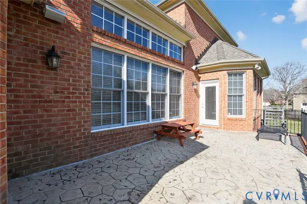 a bathroom with a tub and a sink