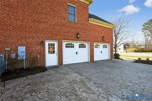 a view of front door with wooden floor and door