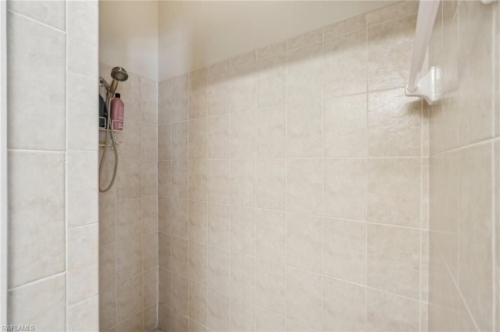 3653 Periwinkle Way Naples, FL 34114 - Photo 21 of 49 Bathroom view of a tile shower