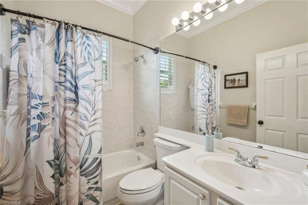 3653 Periwinkle Way Naples, FL 34114 - Photo 23 of 49 Full bath featuring vanity, shower / bath combo, and ornamental molding