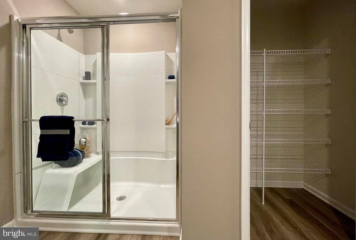 1145 Wintermead Loop Salisbury, MD 21801 - Photo 36 of 51 a bathroom with a glass shower door
