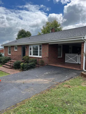 a front view of a house with garage