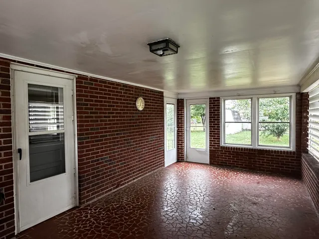 a view of livingroom with furniture and windows