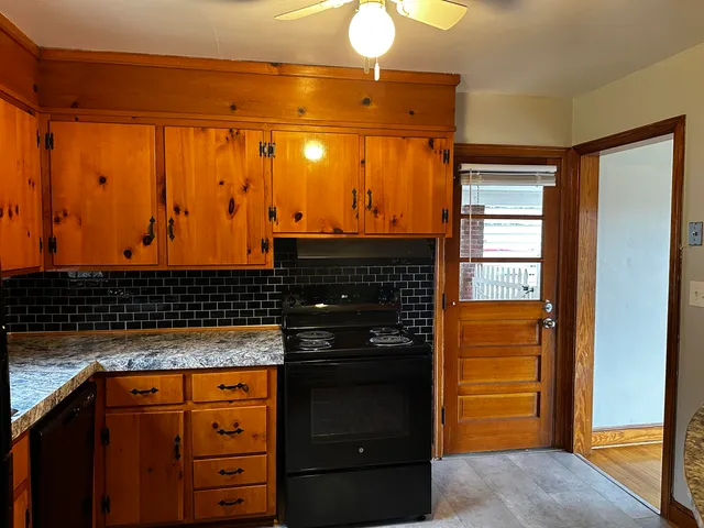 a view of a refrigerator in the kitchen