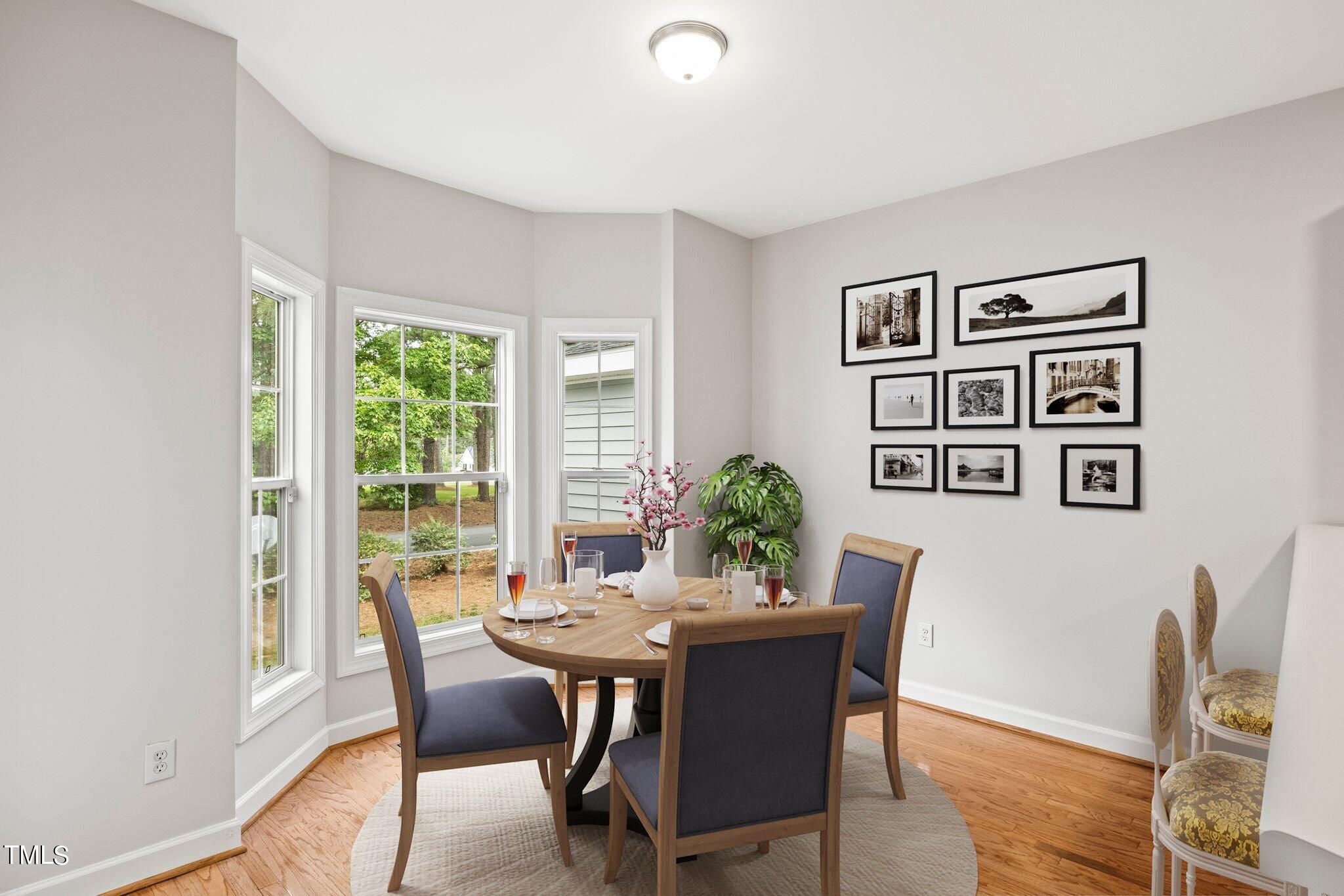 216 Grand Springs Garner, NC 27529 - Photo 8 of 21 Virtually staged dining area
