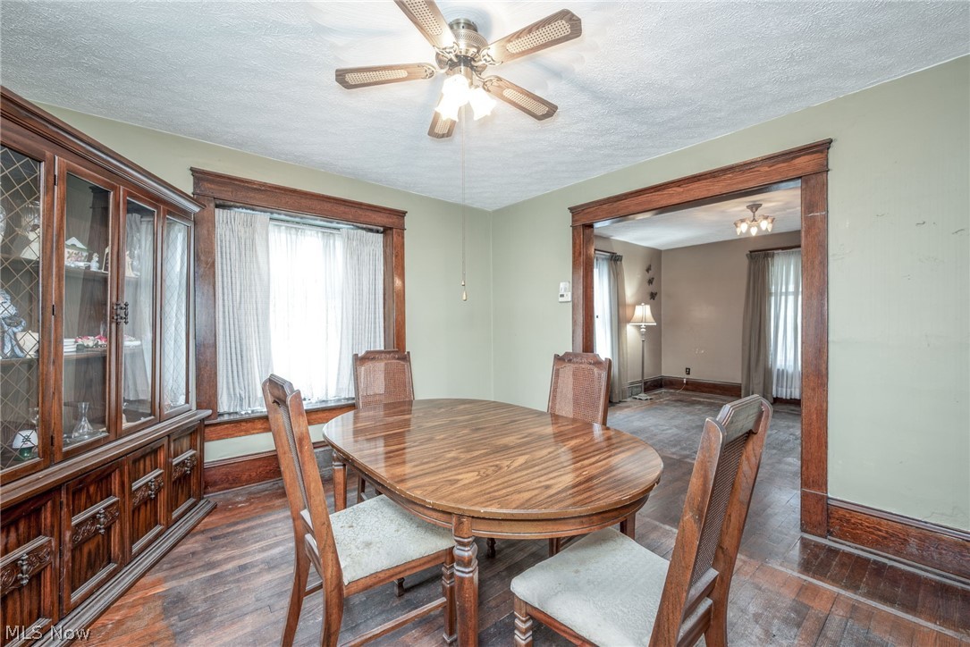 267 West Riddle Avenue Ravenna, OH 44266 - Photo 7 of 47 Hardwood flooring, wood trim, ceiling fan, and built-in cabinetry