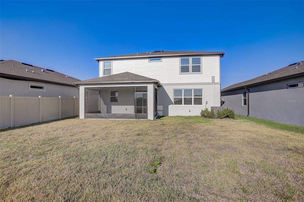 12918 Brookside Moss Drive Riverview, FL 33579 - Photo 40 of 43 a front view of a house with a garden