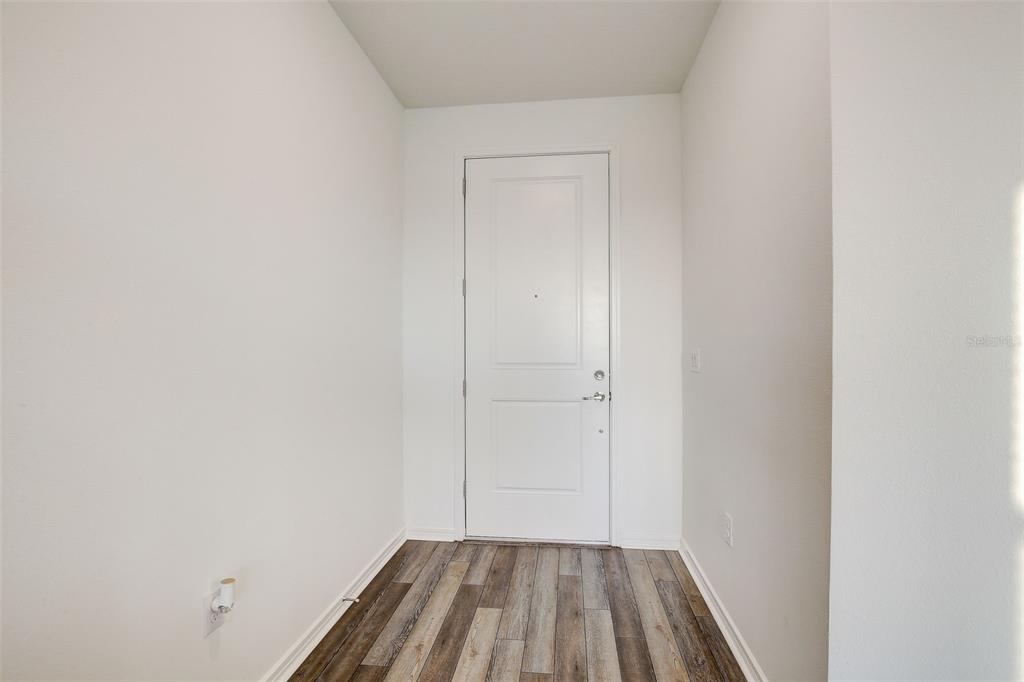 12918 Brookside Moss Drive Riverview, FL 33579 - Photo 5 of 43 a view of a room with wooden floor