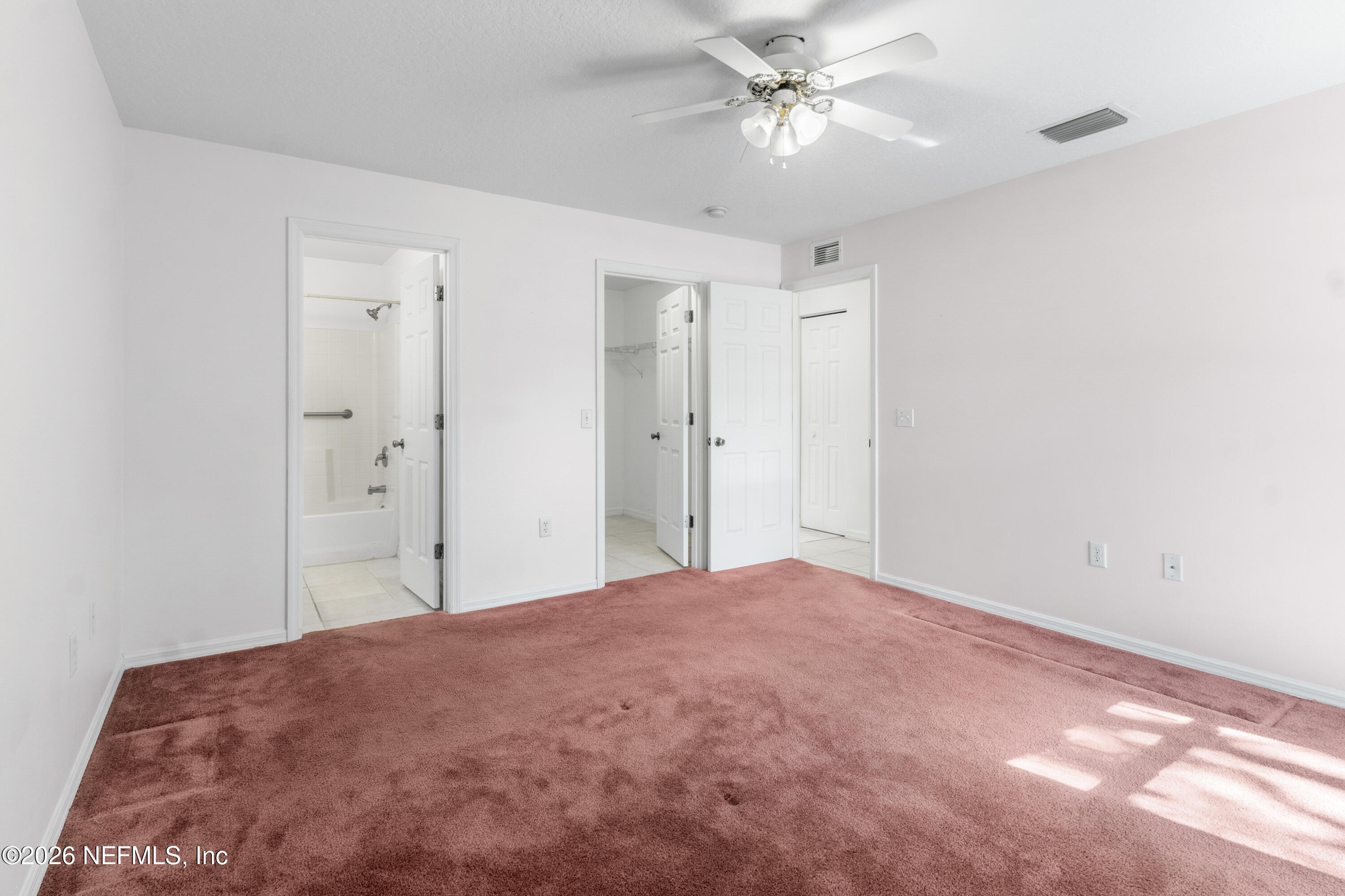 1022 Foster Road Sebastian, FL 32958 - Photo 11 of 30 a view of a big room with closet and a ceiling fan