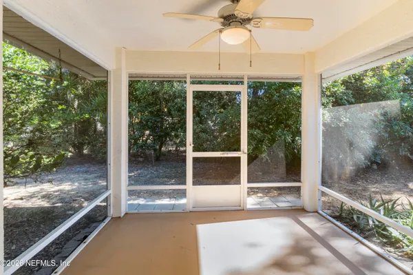 a view of a room with a large window