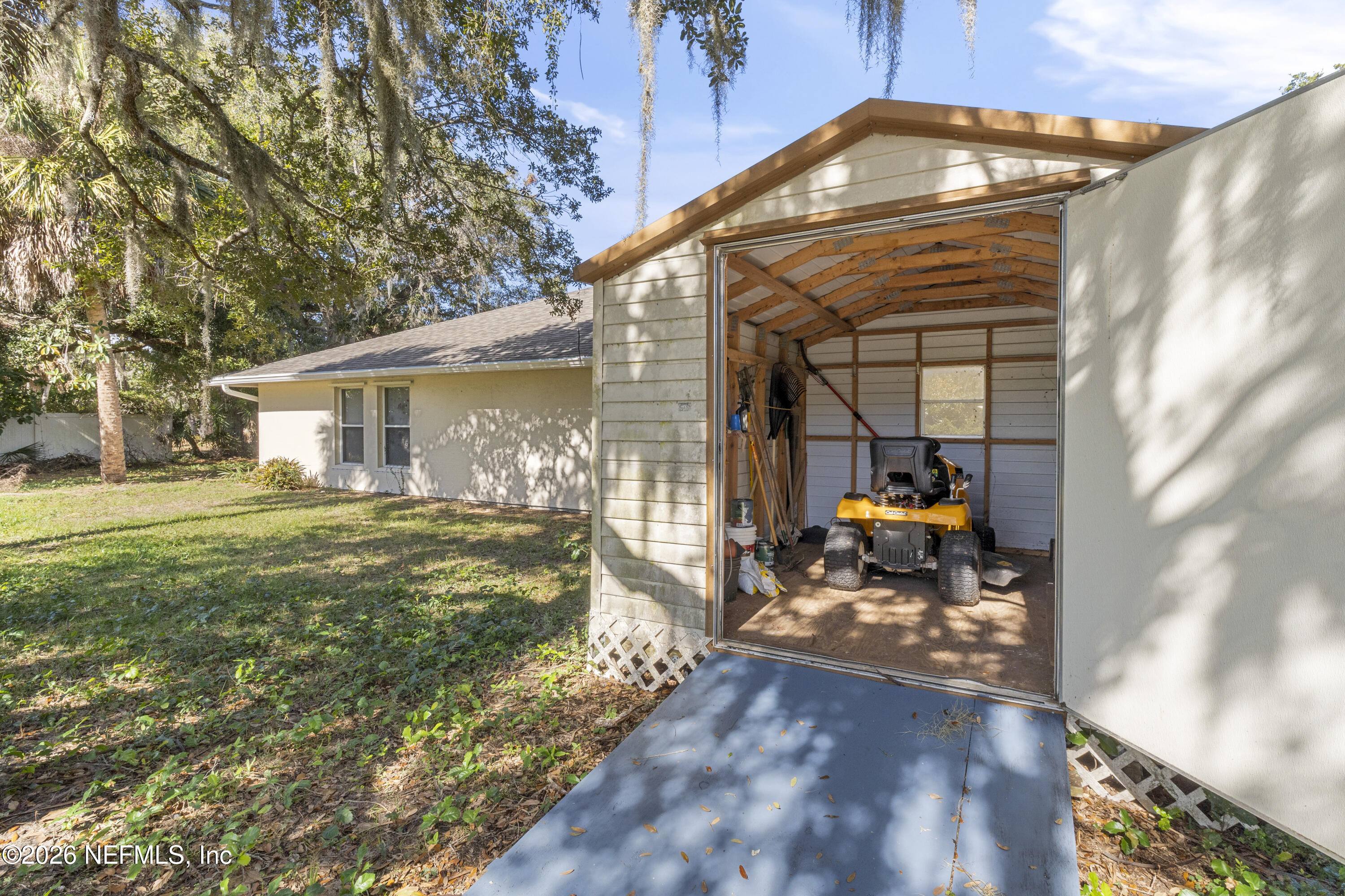 1022 Foster Road Sebastian, FL 32958 - Photo 23 of 30 a view of a house with a patio