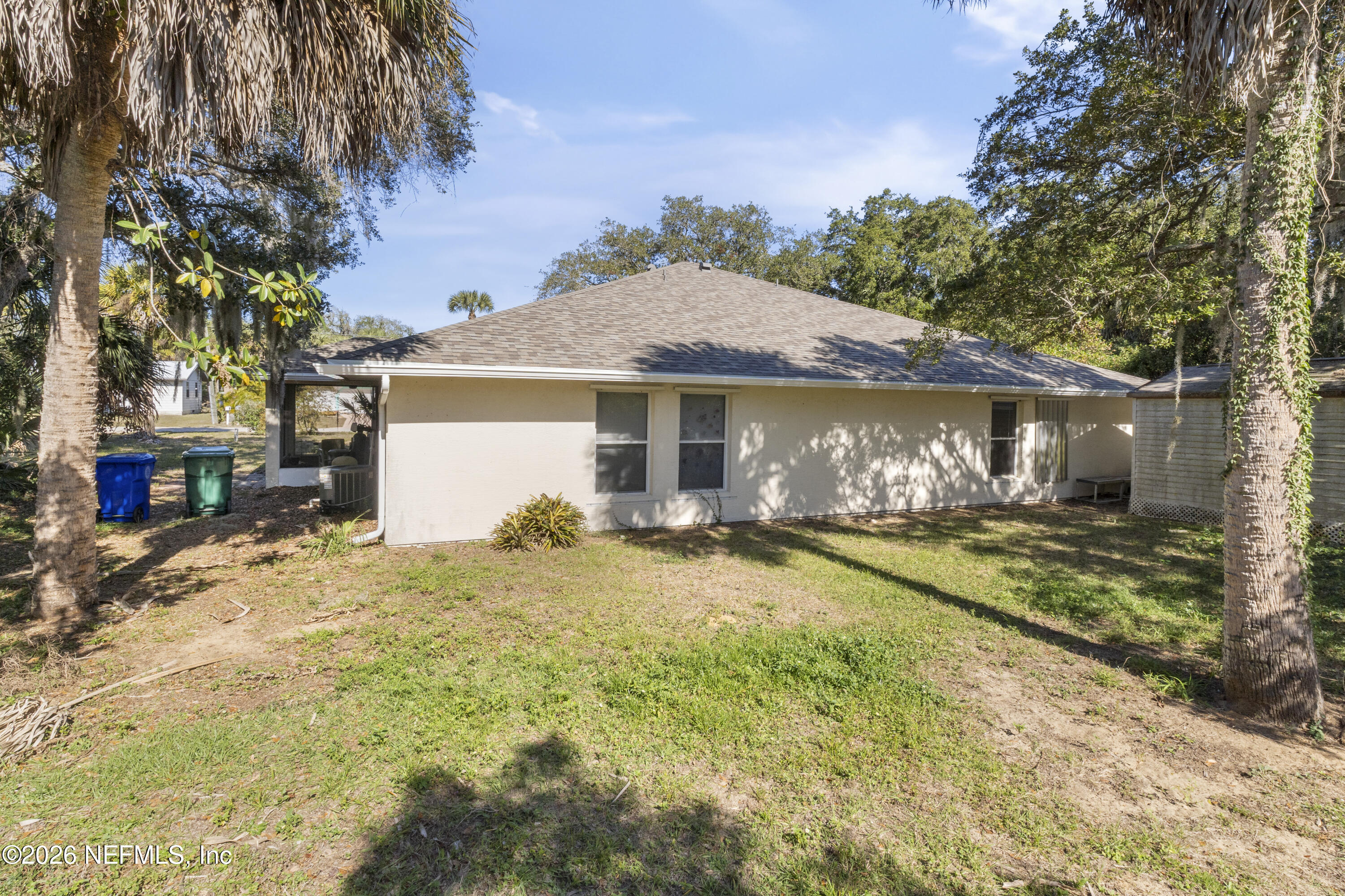 1022 Foster Road Sebastian, FL 32958 - Photo 25 of 30 a front view of a house with garden