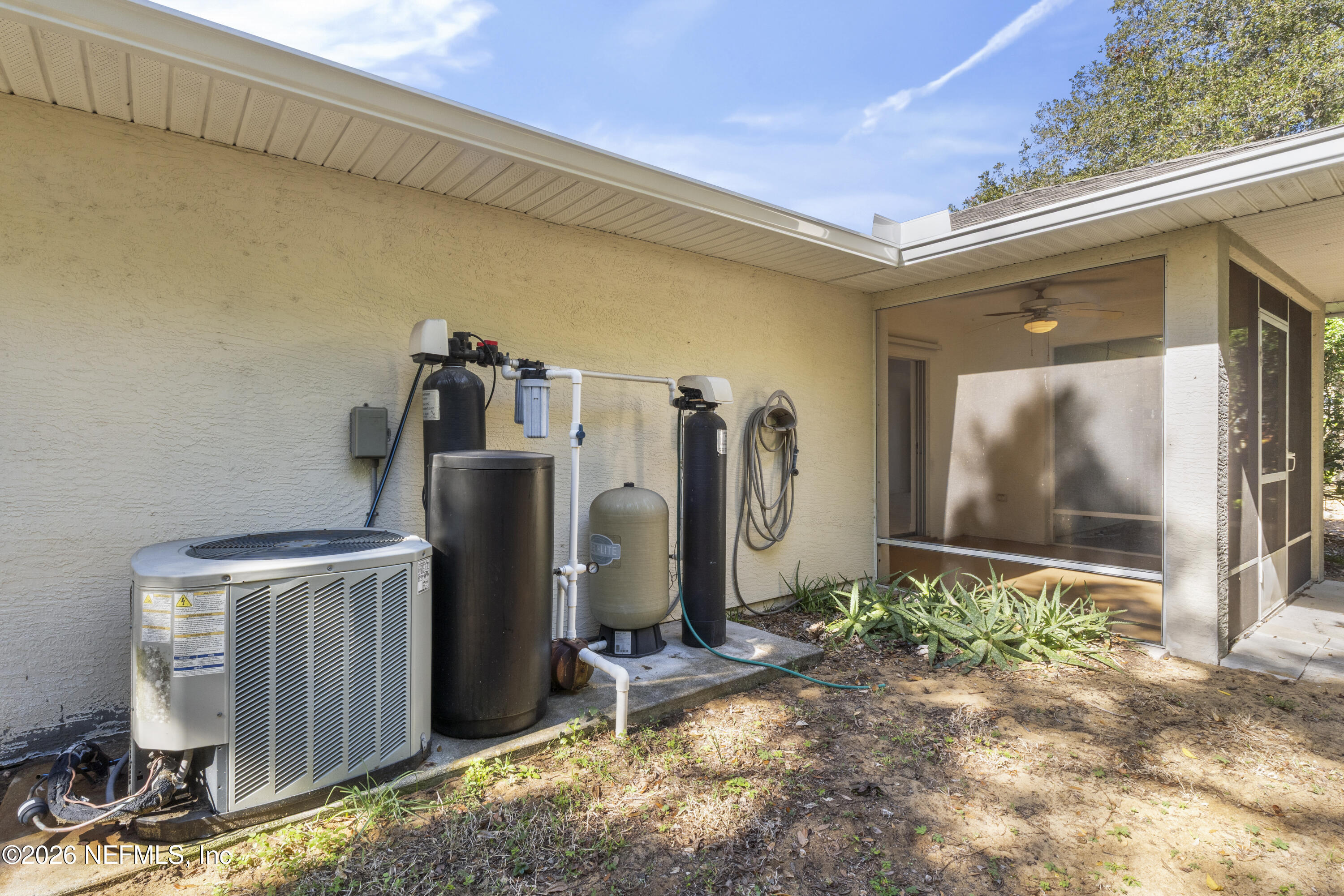 1022 Foster Road Sebastian, FL 32958 - Photo 26 of 30 a view of a front door and wooden door