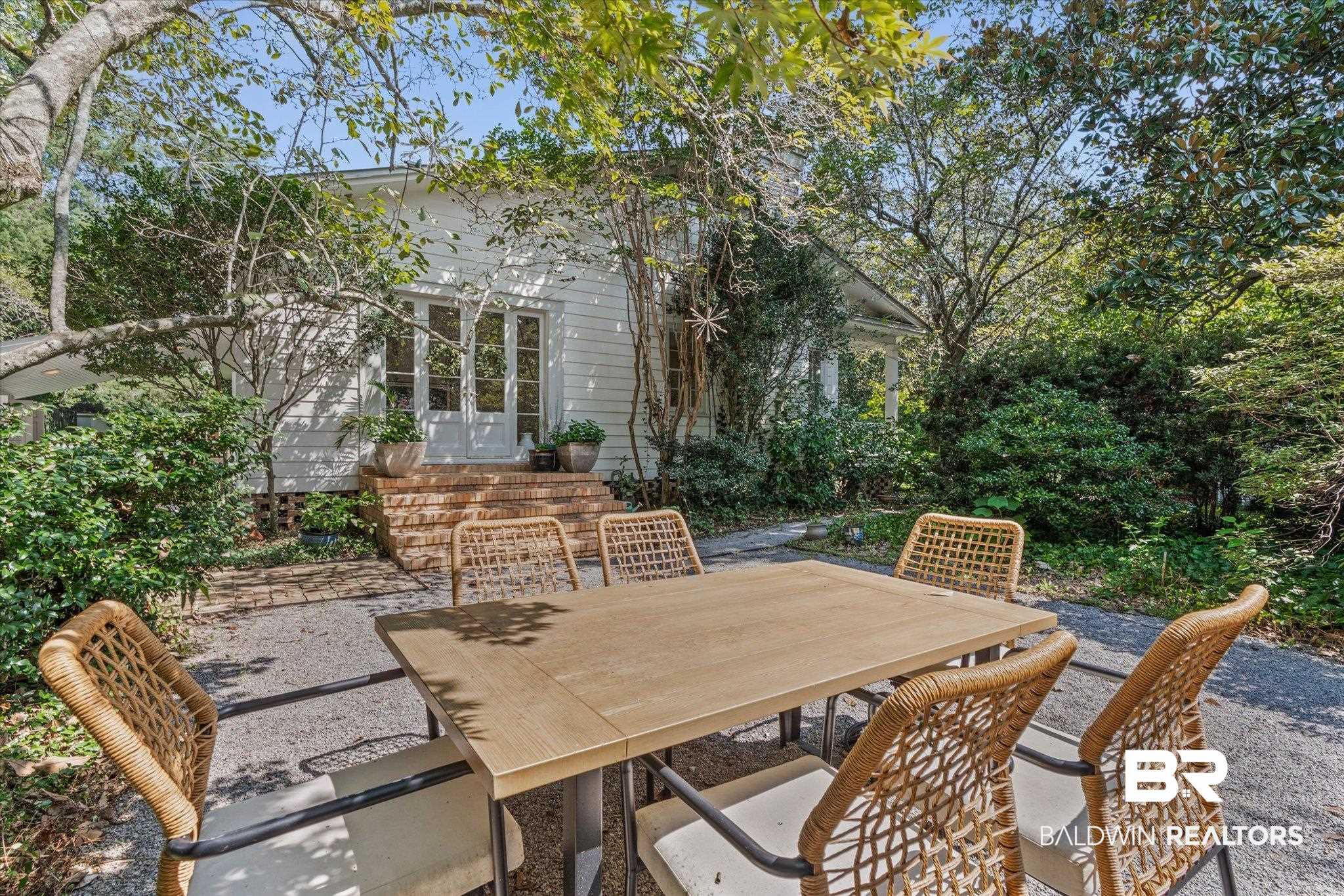 151 Tuthill Lane Mobile, AL 36608 - Photo 29 of 41 View of patio / terrace featuring french doors and outdoor dining area