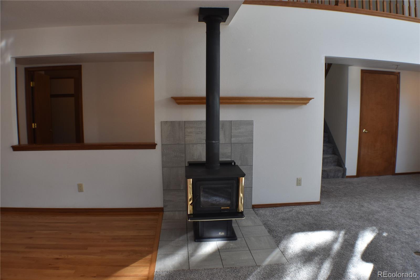 14540 Rosholt Loop Colorado Springs, CO 80921 - Photo 12 of 50 a view of a hallway with seating area