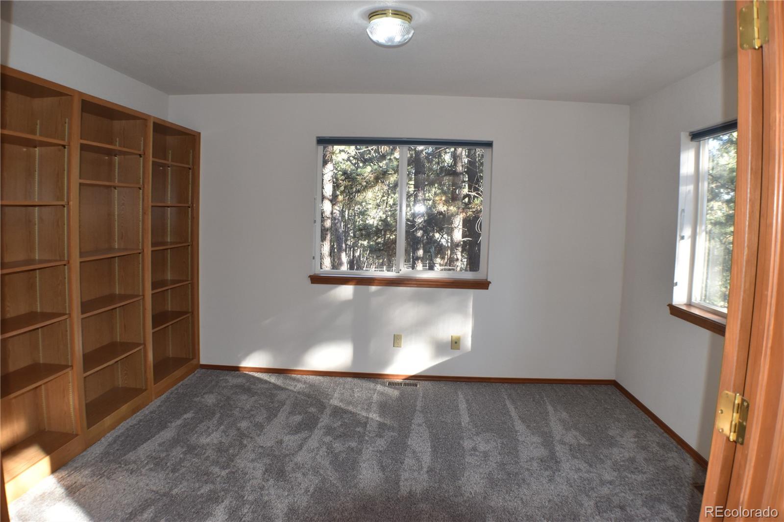 14540 Rosholt Loop Colorado Springs, CO 80921 - Photo 13 of 50 a view of a door in a room