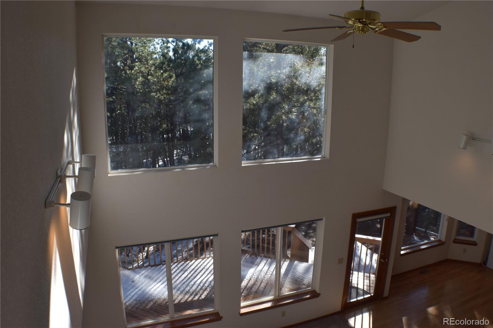 14540 Rosholt Loop Colorado Springs, CO 80921 - Photo 27 of 50 a view of a livingroom with furniture and windows