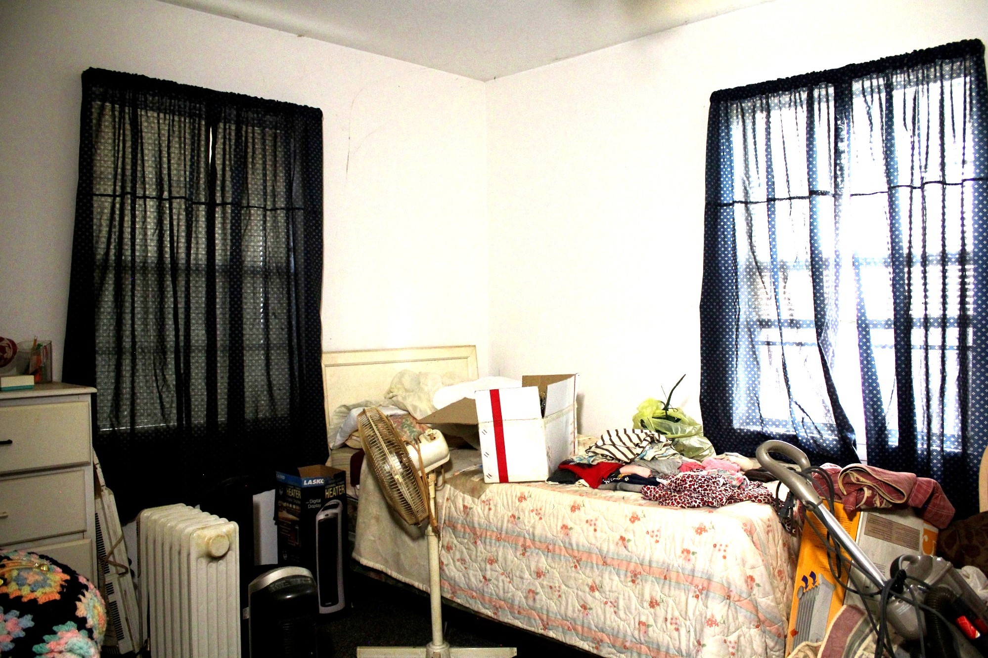 386 Lawrence Road Trinity, TX 75862 - Photo 14 of 30 a bedroom with a bed and large windows