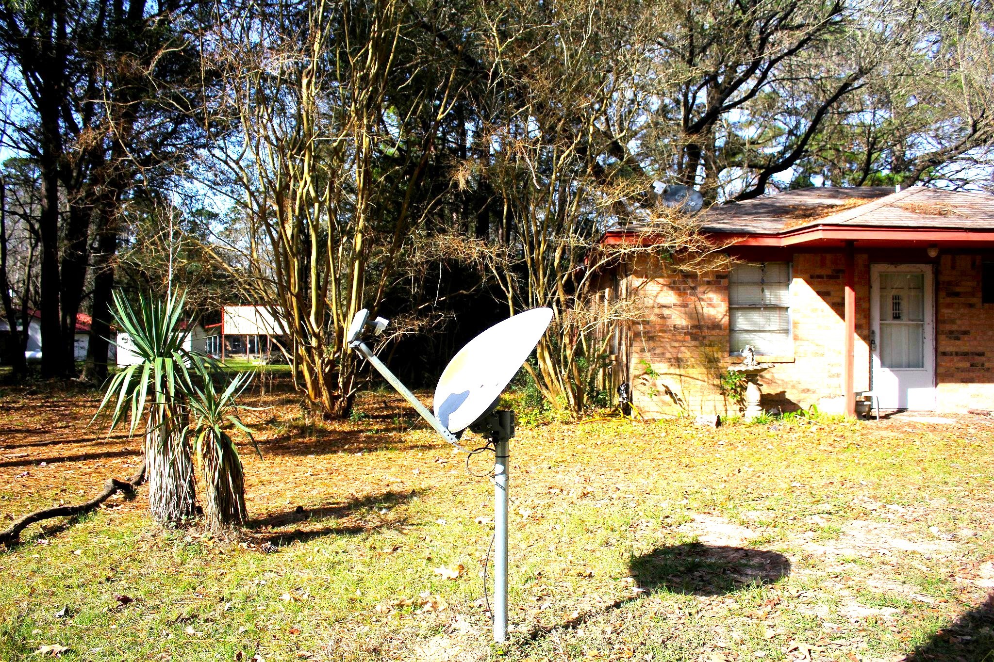 386 Lawrence Road Trinity, TX 75862 - Photo 30 of 30 a view of a swimming pool with an outdoor seating