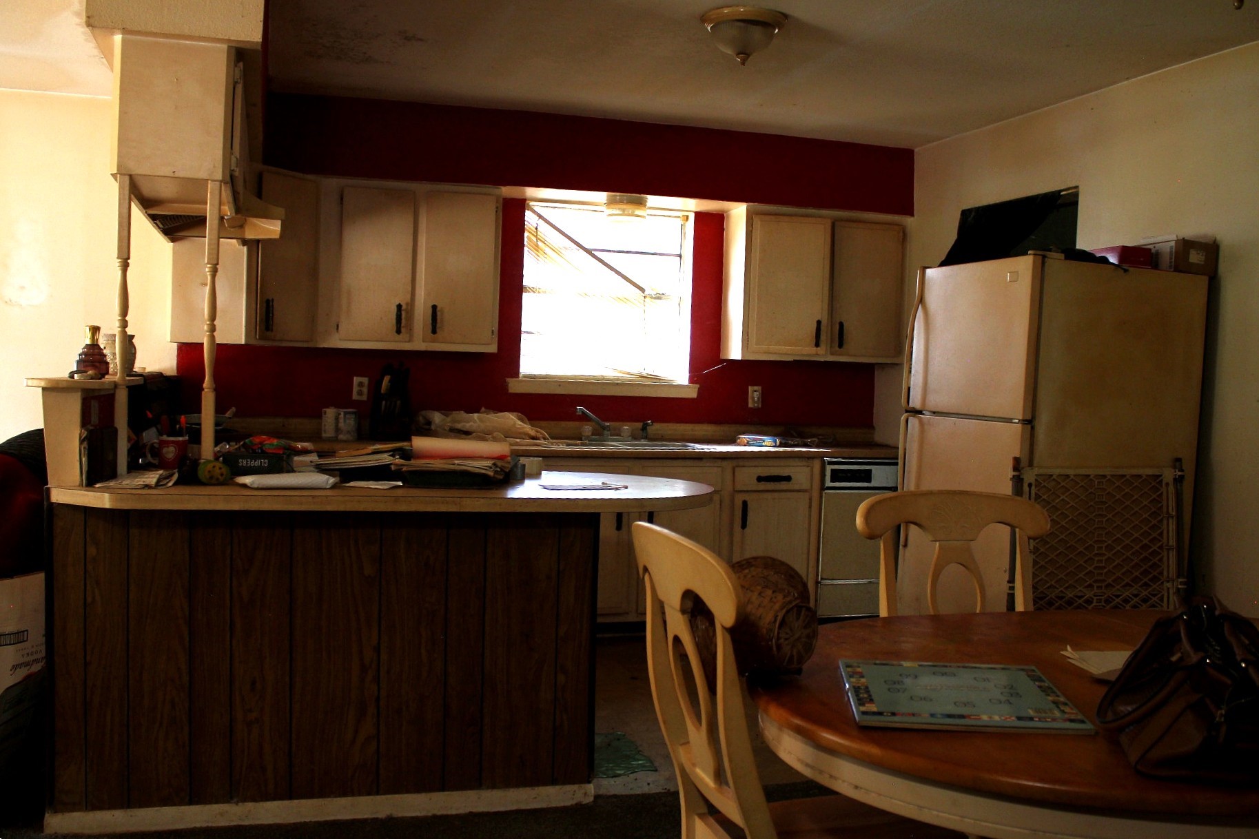 386 Lawrence Road Trinity, TX 75862 - Photo 7 of 30 a kitchen with a refrigerator and a table