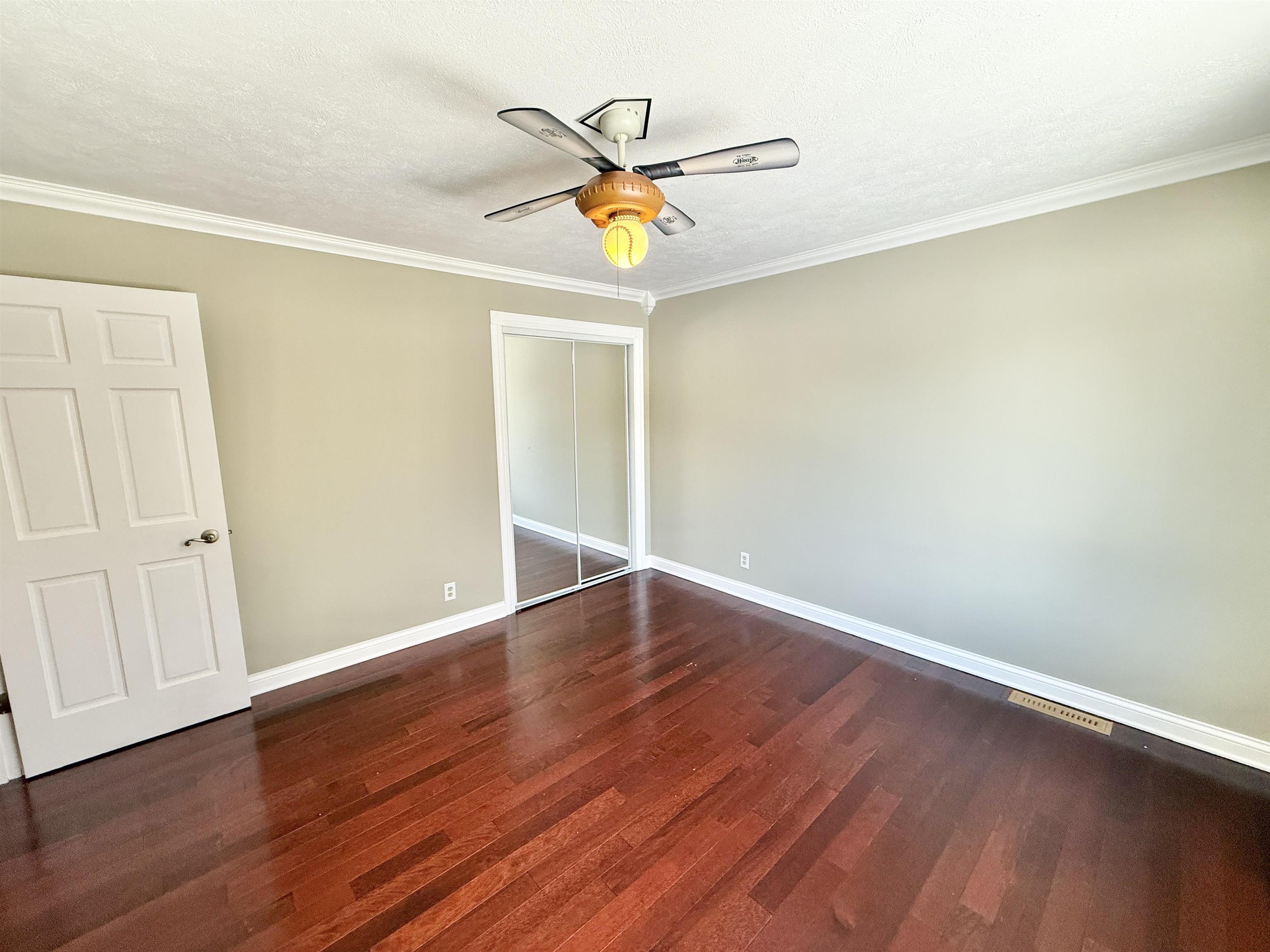 120 Lamplighter Loop Southeast Poplar Grove, IL 61065 - Photo 20 of 30 a view of a room with wooden floor