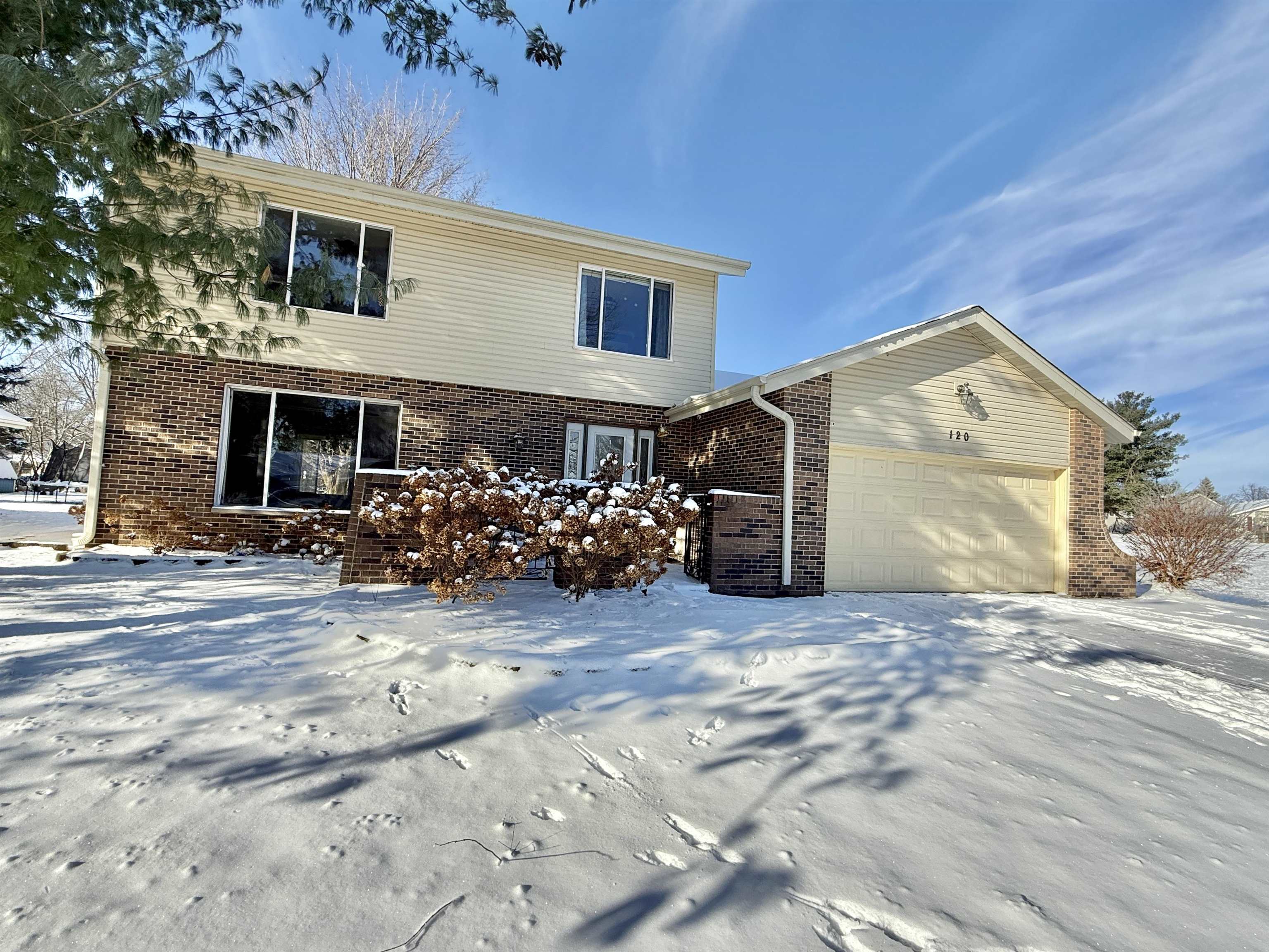 120 Lamplighter Loop Southeast Poplar Grove, IL 61065 - Photo 2 of 30 a view of a house with a patio