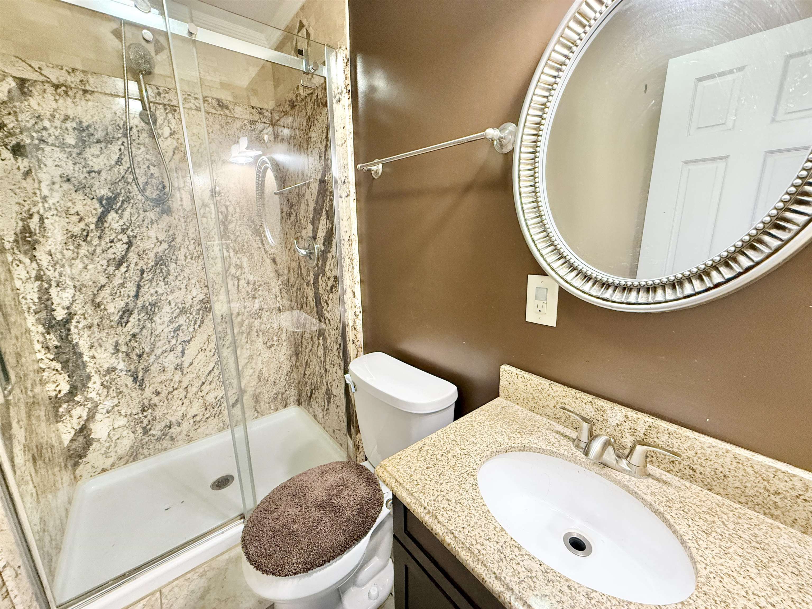 120 Lamplighter Loop Southeast Poplar Grove, IL 61065 - Photo 21 of 30 a bathroom with a sink toilet and shower