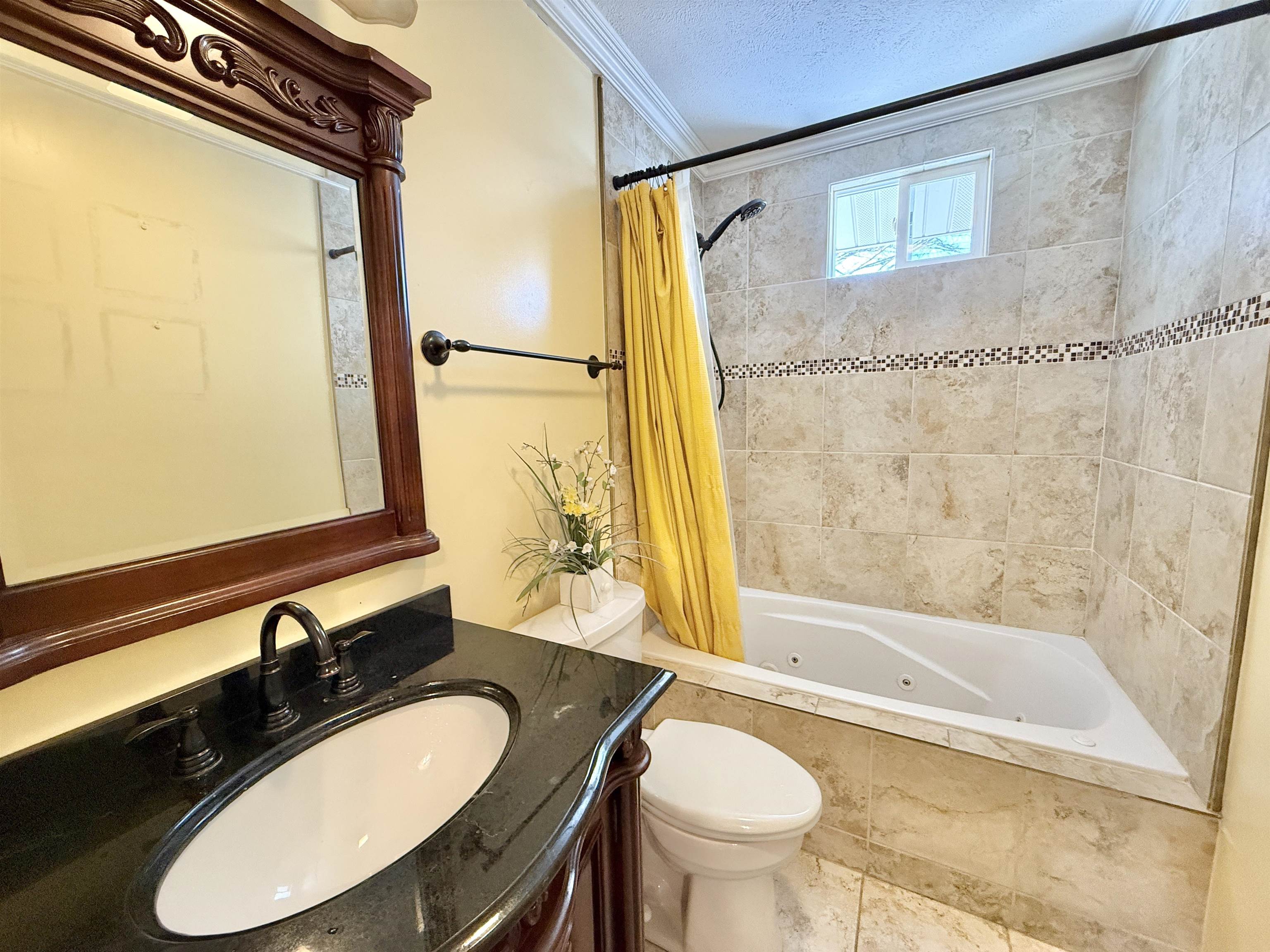 120 Lamplighter Loop Southeast Poplar Grove, IL 61065 - Photo 25 of 30 a bathroom with a granite countertop sink and a mirror