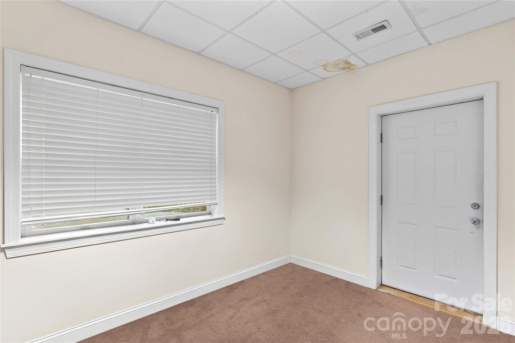 711 Spring Pointe Drive Stony Point, NC 28678 - Photo 28 of 47 a view of a room that has a window in it