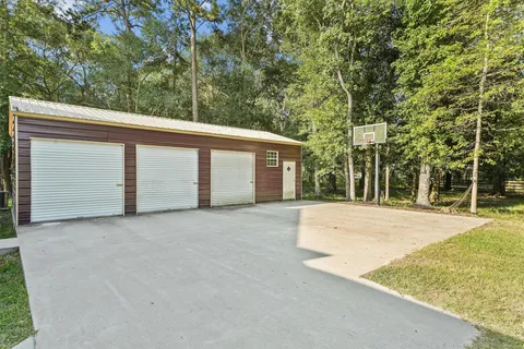 a view of a lake with a yard