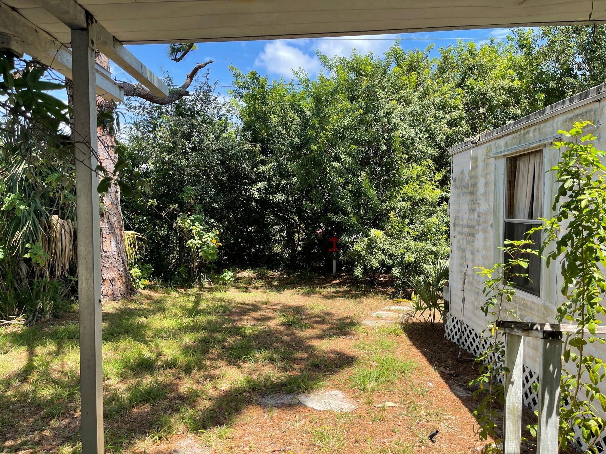 7109 Southeast Ridgeway Terrace Hobe Sound, FL 33455 - Photo 5 of 11 Backyard