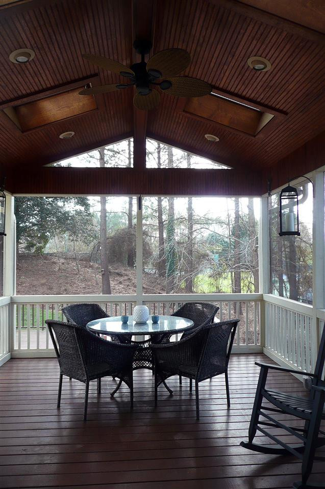 4905 Gable Ridge Lane Holly Springs, NC 27540 - Photo 15 of 25 You will love to spend your evenings out on the screened porch! The wood beadboard cathedral ceiling adds both height and beauty to this large screened porch. Screened Porch With Cathedral Ceiling