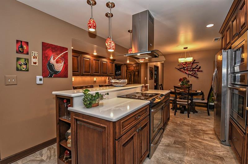 507 Myoma Road Mars, PA 16046 - Photo 10 of 25 View of Huge Island with Counter Seating and Stainless Stove/Overhead Vent as well as Walloven/microwave Combo & Fridge!