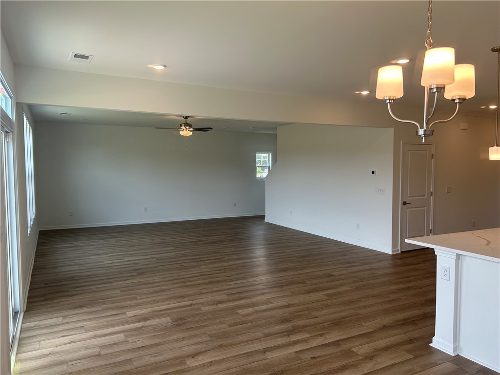 217 Bellflower Lane Anderson, SC 29625 - Photo 27 of 27 An open floorplan features recessed lighting and durable wood flooring.