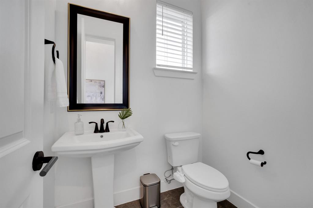 1516 M3 Ranch Road Mansfield, TX 76063 - Photo 10 of 40 Half Bath is located just off the entry way in between Media Room and Office, convenient for guests!