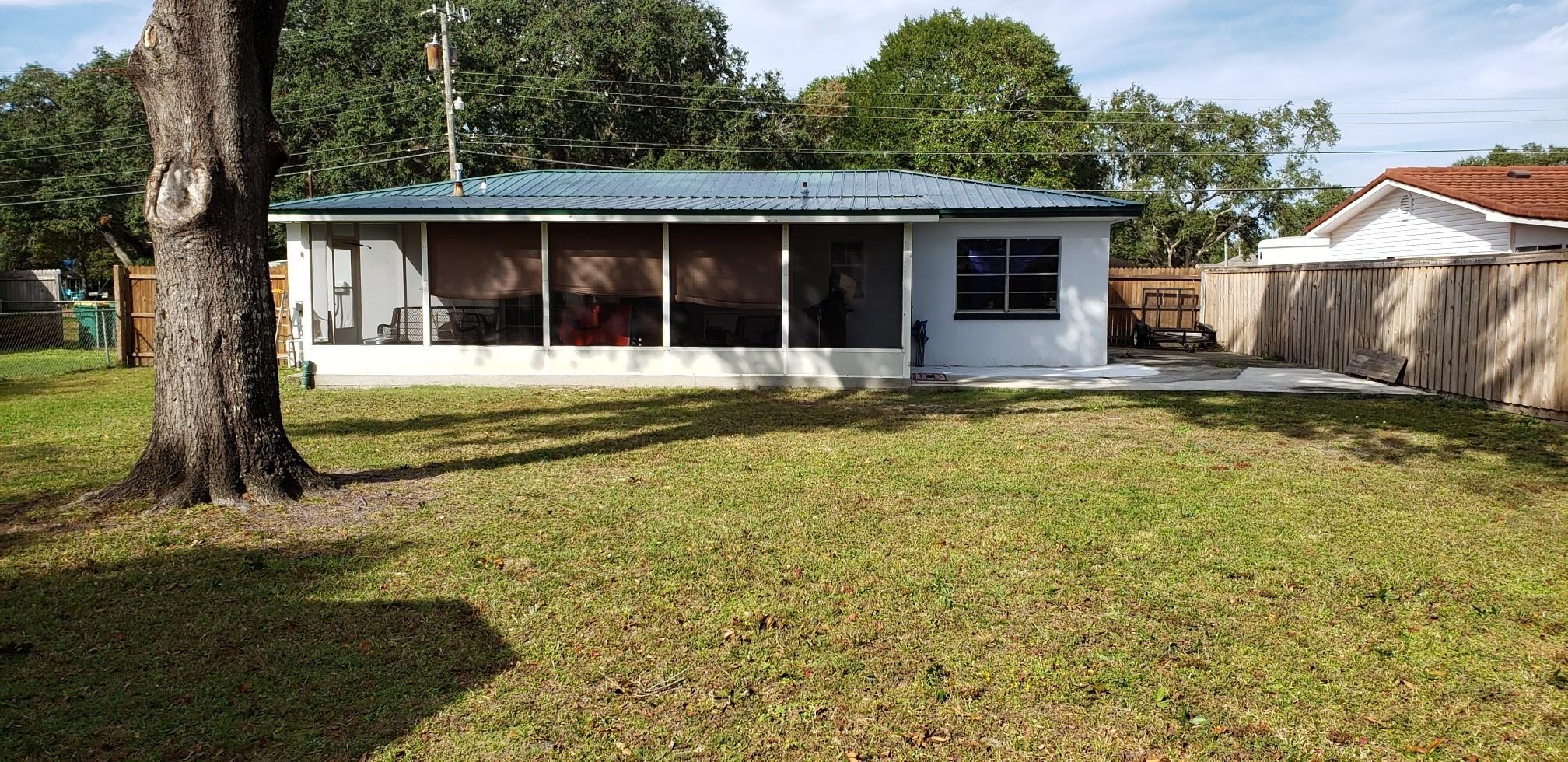 419 Marlowe Drive Fort Walton Beach, FL 32547 - Photo 2 of 12 a view of a house with a yard and sitting area